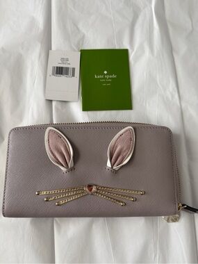 kate spade grey bunny zip-around wallet with gold whisker accents